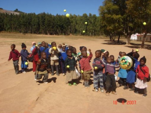 pre-school children playing with toys sent out from UK