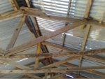 The timber is seriously weakened. Re-roofing is the only solution - perhaps a complete rebuild would bet better sine the follr has gone too.