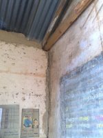 water stains the walls as it runs down inside the classrooms. Pity the roof doesn't leak.