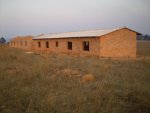 One classroom block finished - money to pay for the roof putting onto the second has been sent