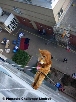Raising money by abseiling 100 feet from the top of an hotel for children in Africa can be fun!